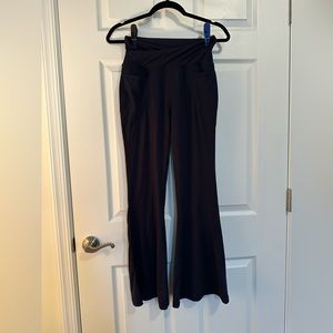 Navy Yoga ❄️pants with a flare cut. Cross over banding at waist.